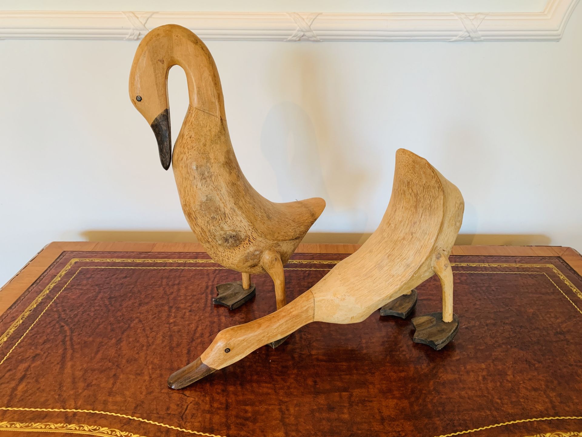 Two carved wooden ducks