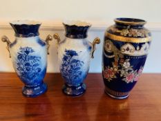 Pair of blue glaze vases, together with a blue and gilt vase