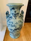 Blue glazed urn decorated with an oriental scene