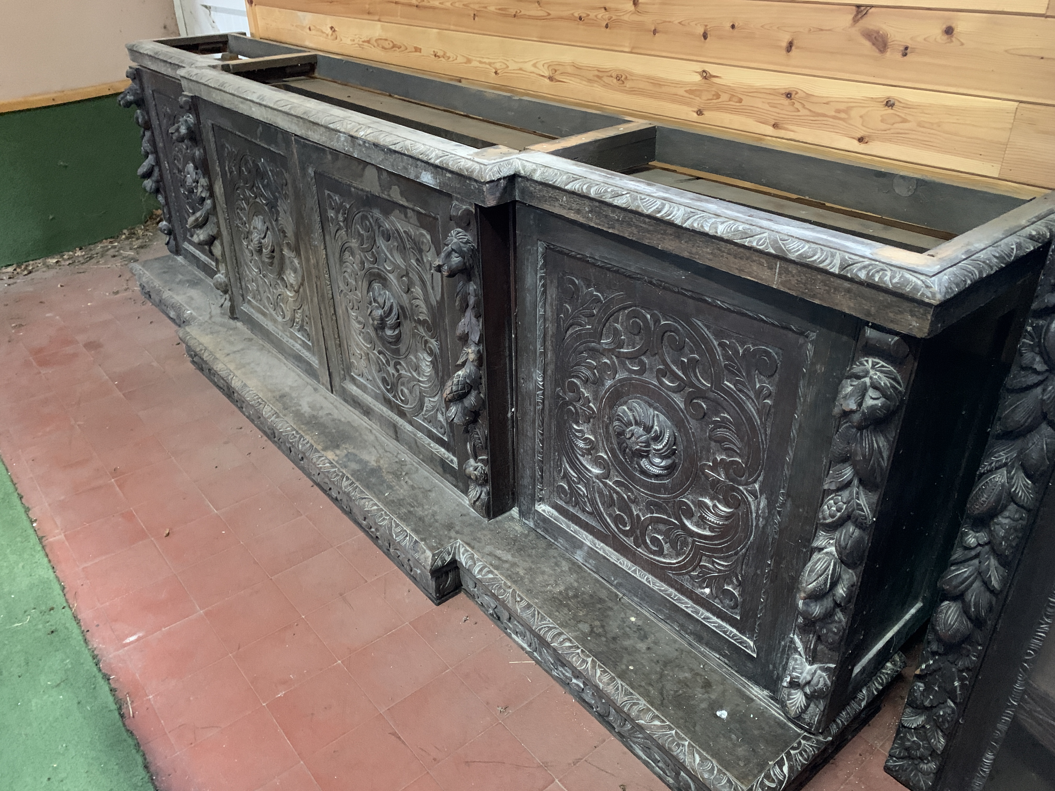 Victorian heavily carved glazed bookcase over four cupboards - Image 7 of 10