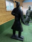 A Qin style terracotta figure of a standing soldier