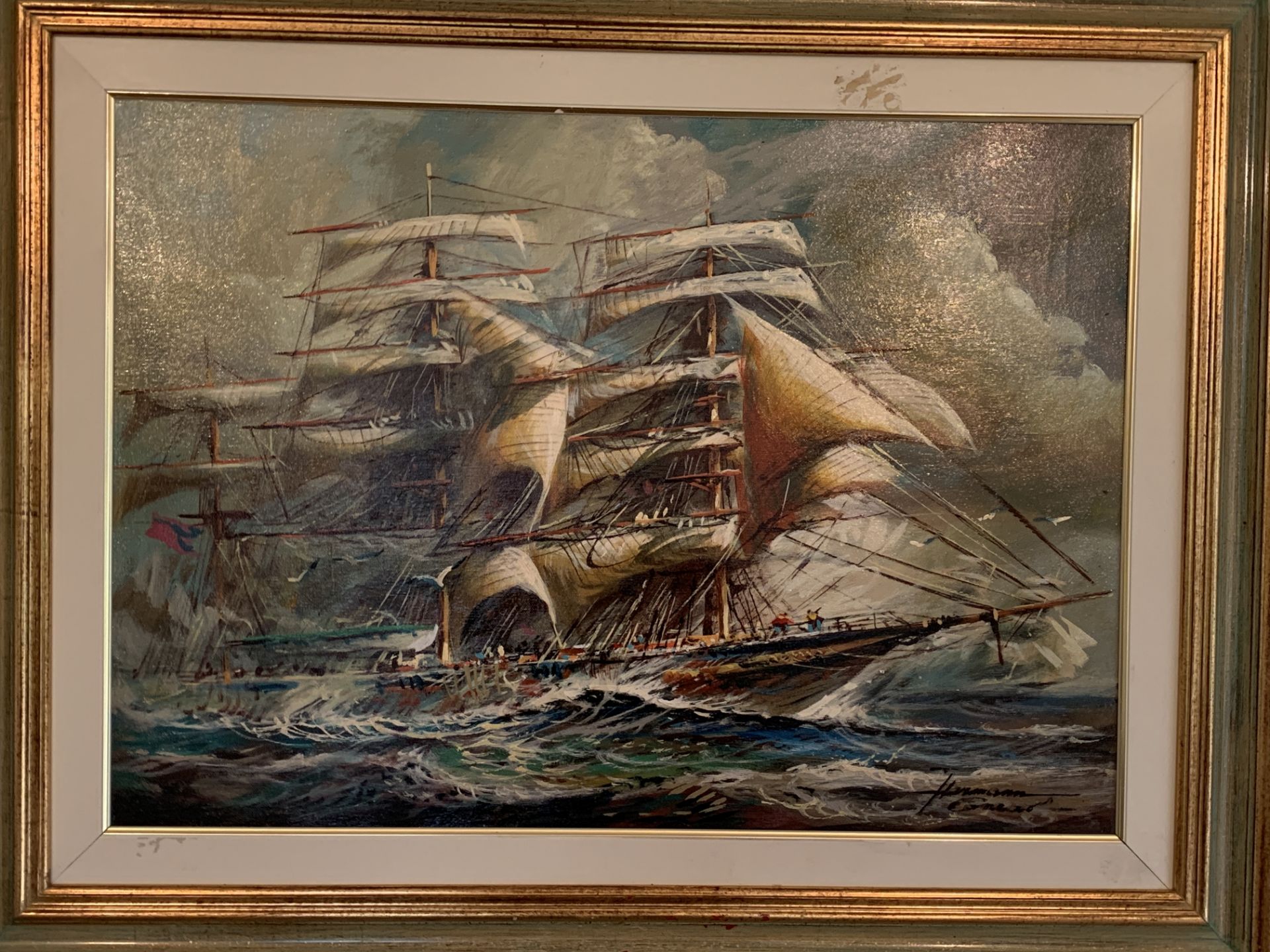 Framed oil on canvas of a sailing ship