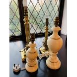 Two brass table lamps together with two onyx table lamps