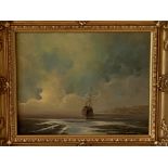 Pair of gilt framed oils on board of ships on a beach