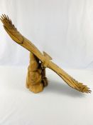 Wooden sculpture of an Eagle in flight