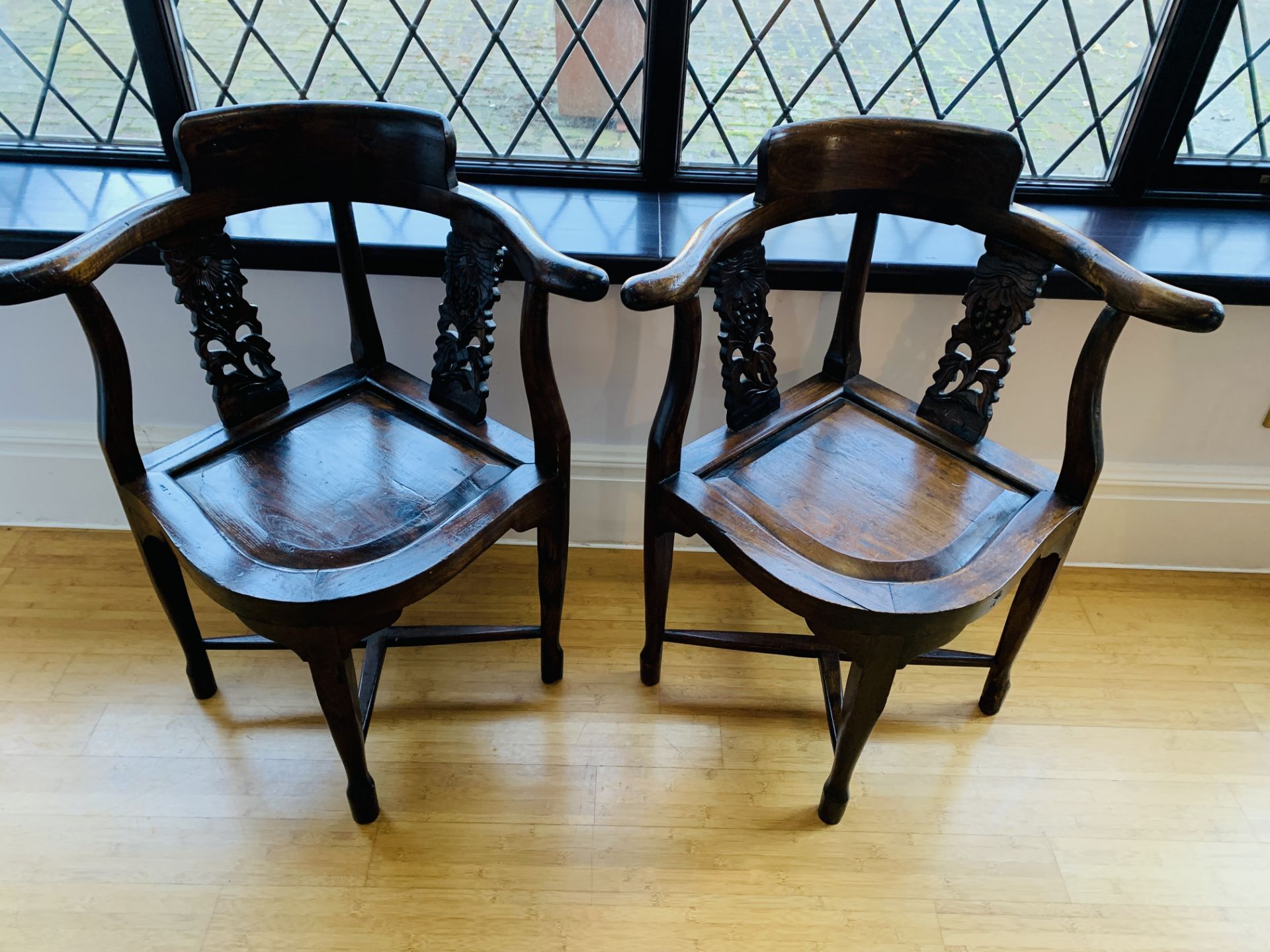 Pair of corner elbow chairs