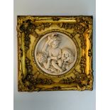 Two gilt framed cast marble high relief moulds with scenes of girls