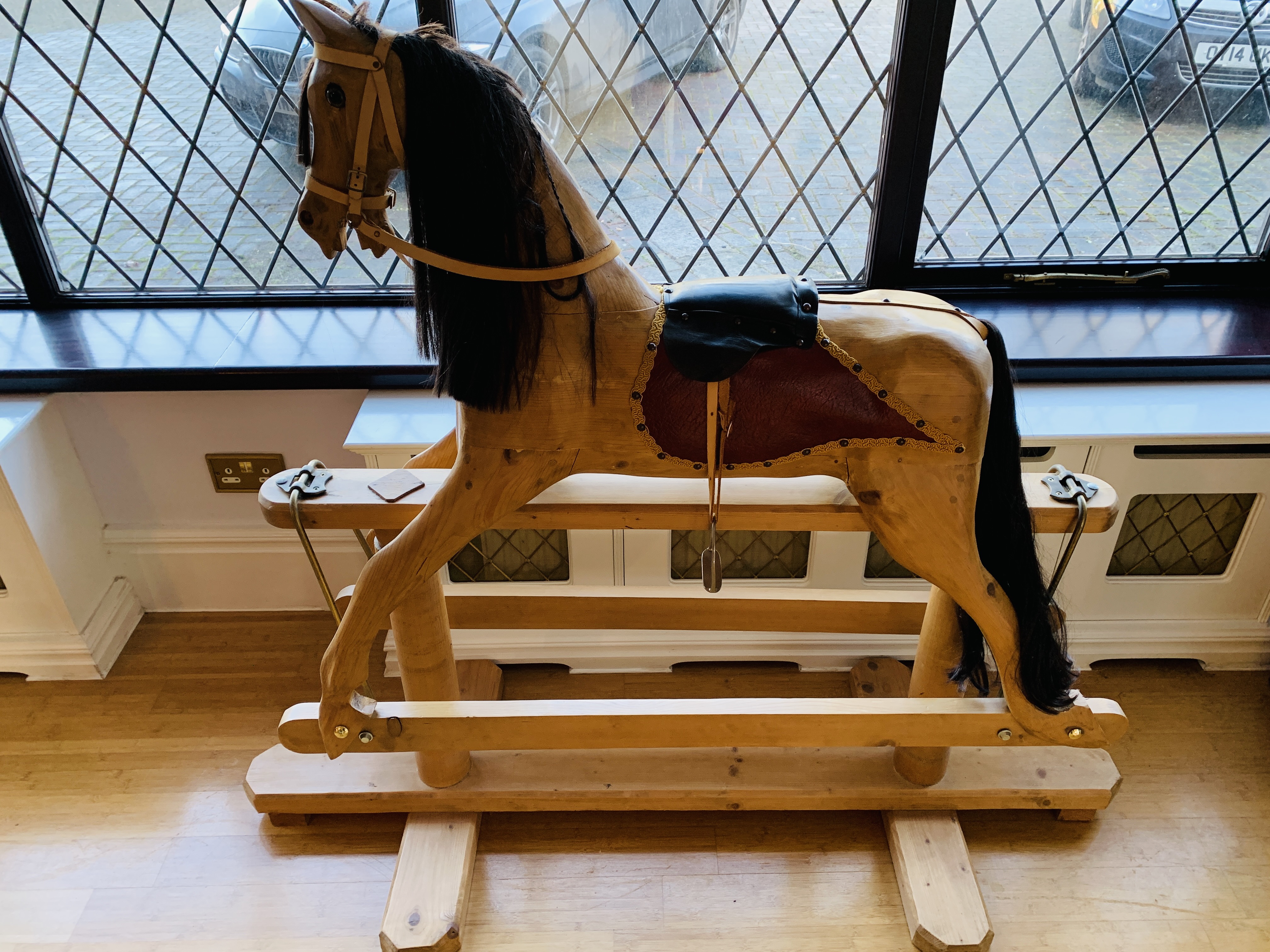 Carved wood rocking horse