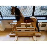 Carved wood rocking horse