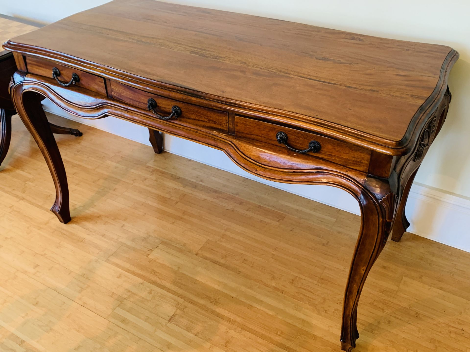 Carved hardwood display table