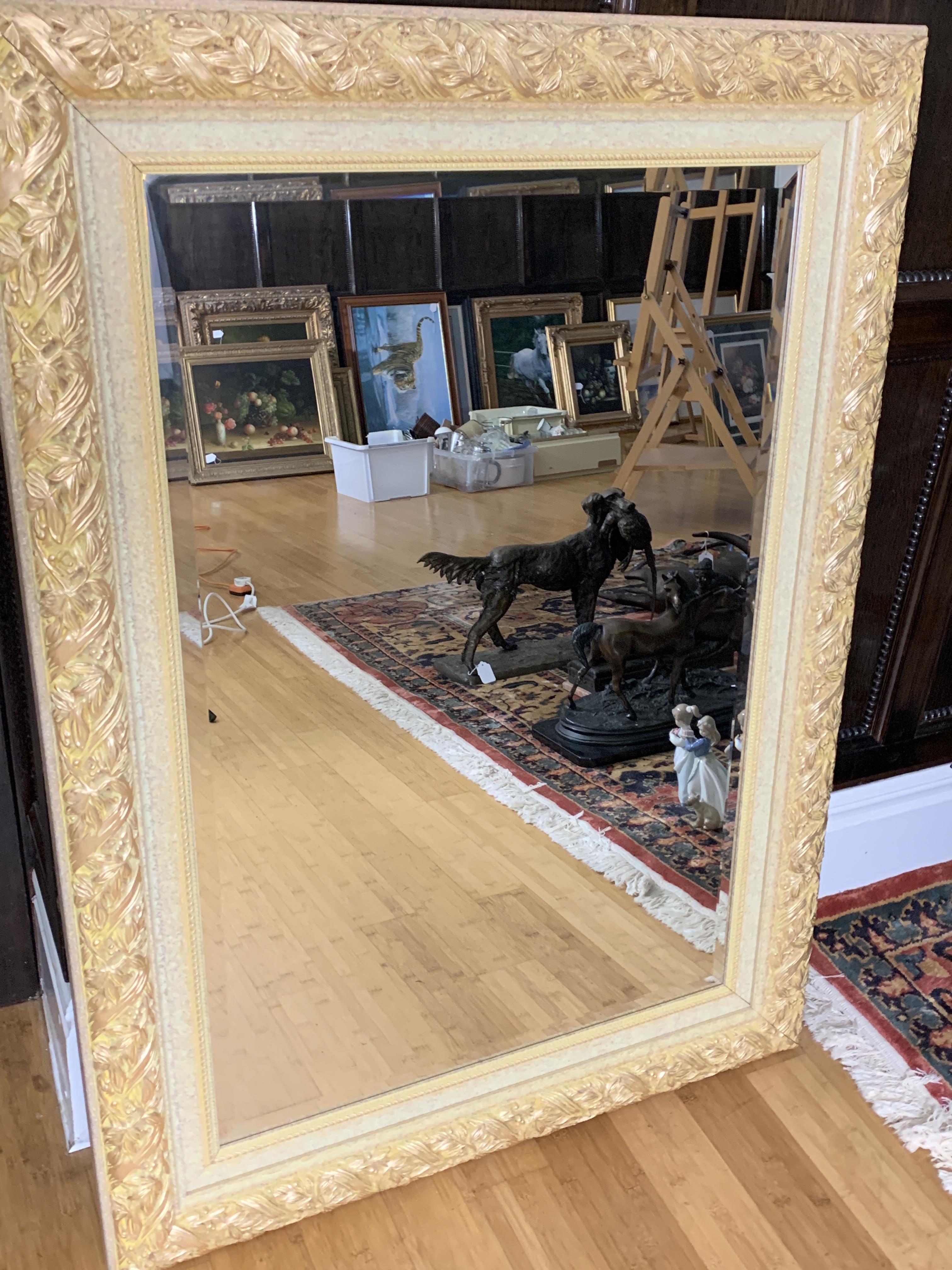 Gilt frame bevelled edge wall mirror