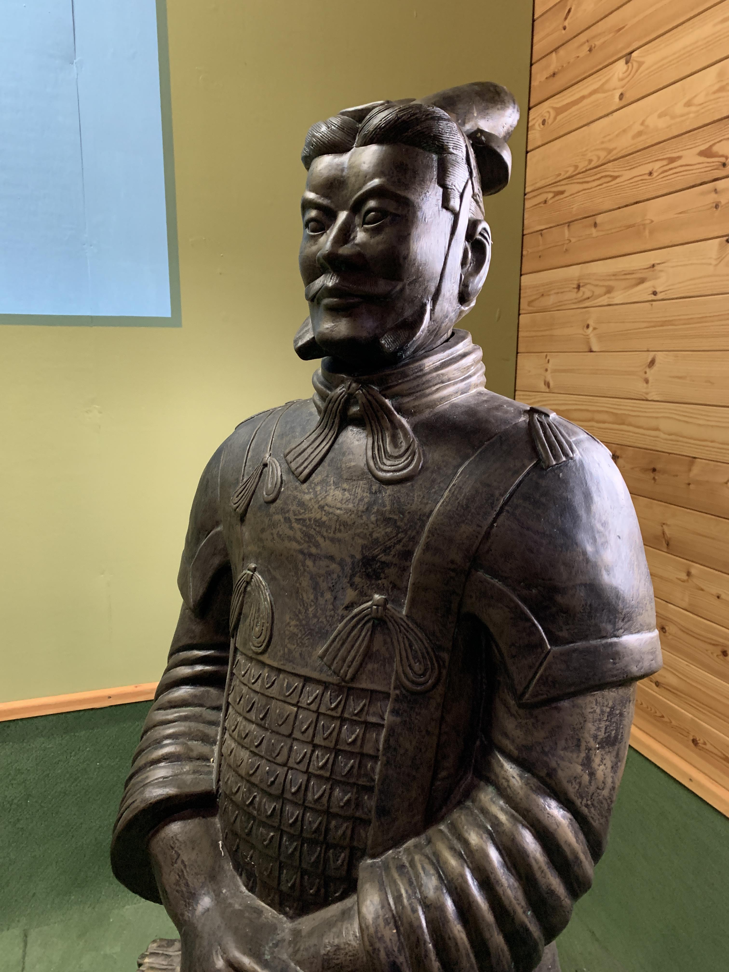 A Qin style terracotta figure of a high ranking officer