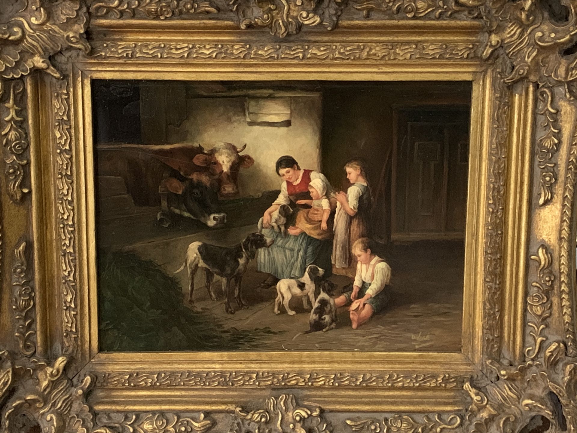Heavy ornate gilt frame oil on board of family with cows and dogs, signed D Vere