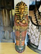 Ornately painted sarcophagus shelf unit