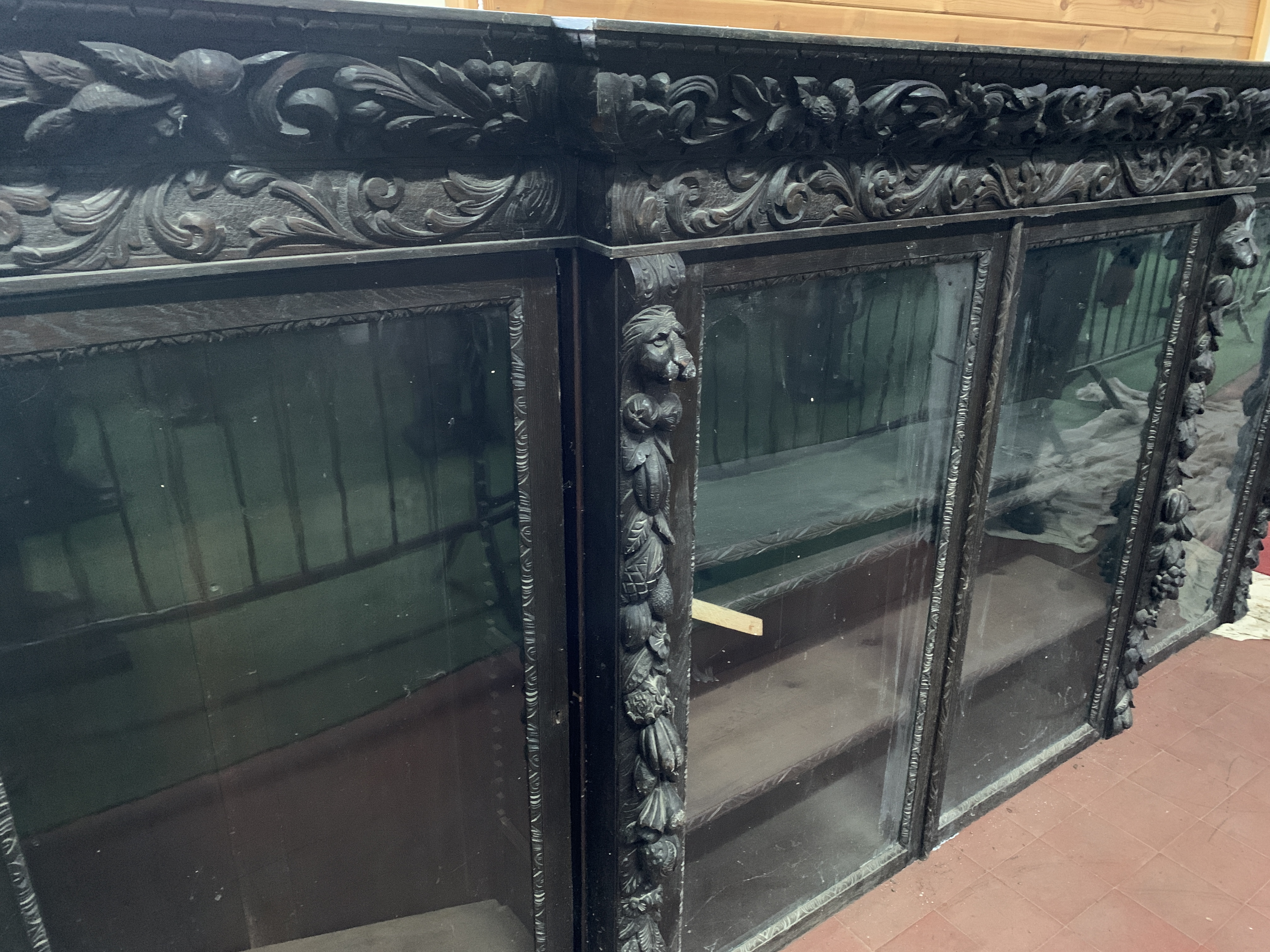Victorian heavily carved glazed bookcase over four cupboards - Image 6 of 10