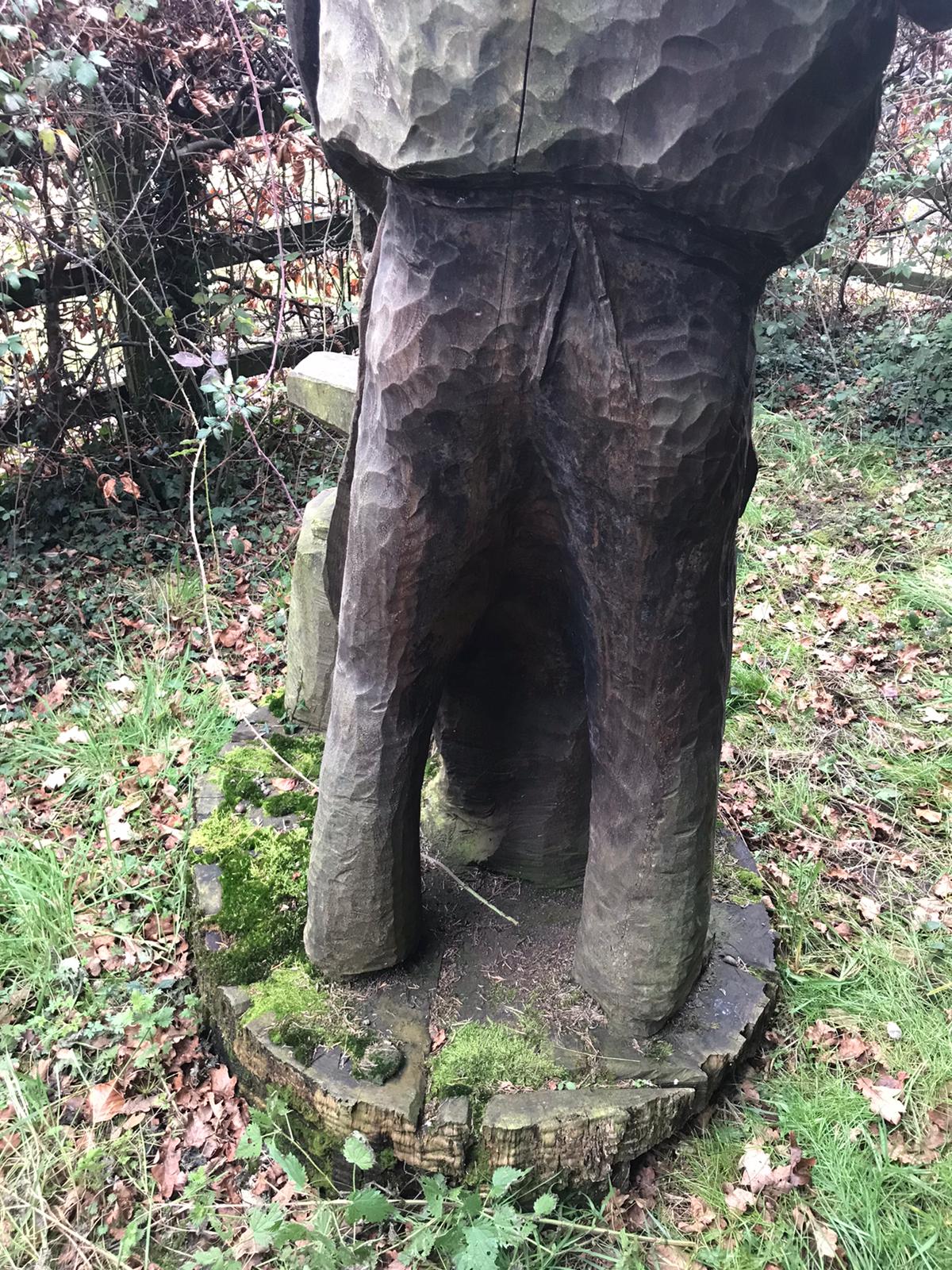 Carved wood statue of a blacksmith - Image 2 of 4