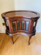 Carved hardwood display cabinet