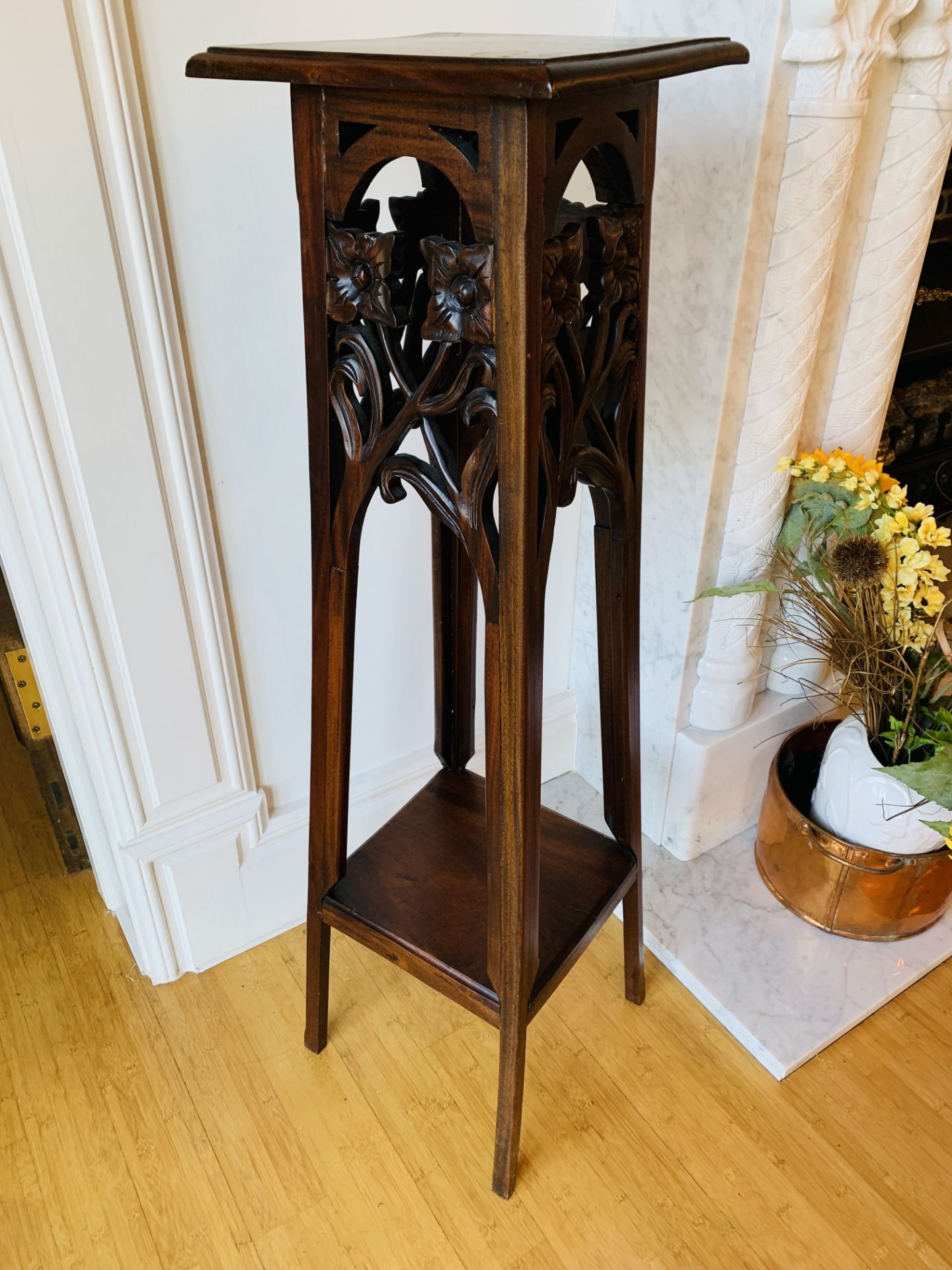 Carved jardiniere stand