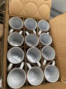 Twelve straight sided mugs