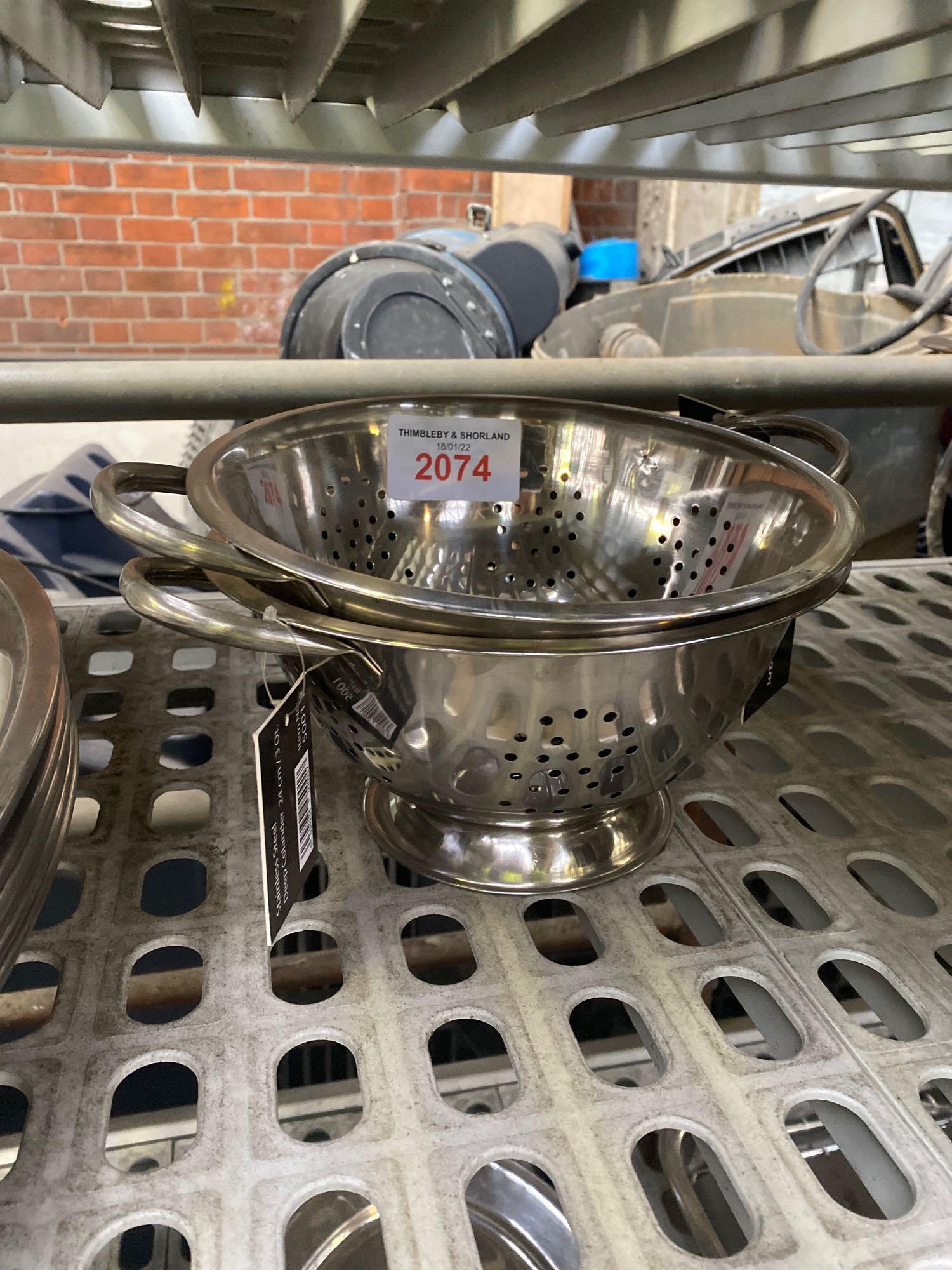 Two stainless steel colanders