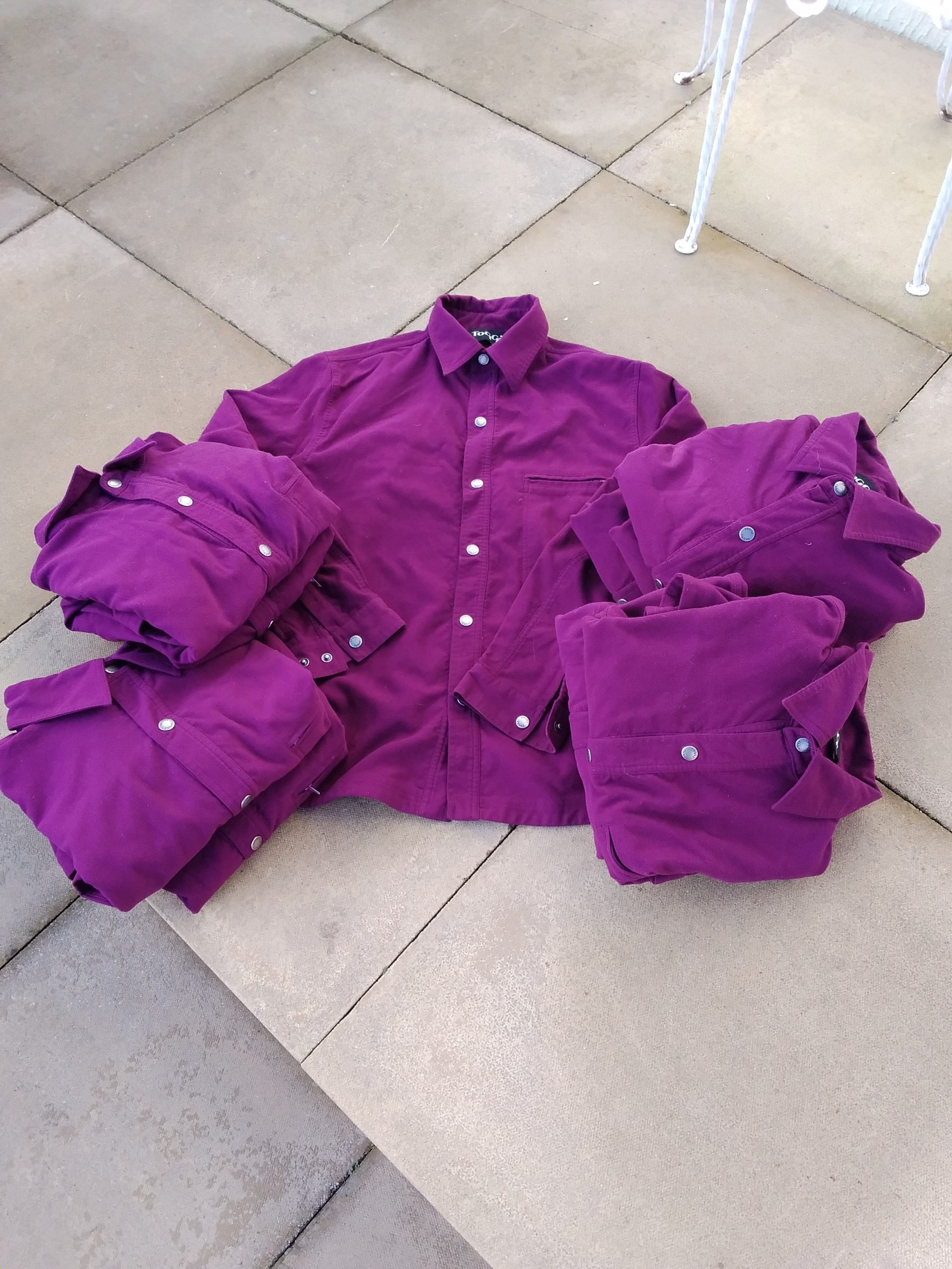 10 new Toggi shirts, various sizes.