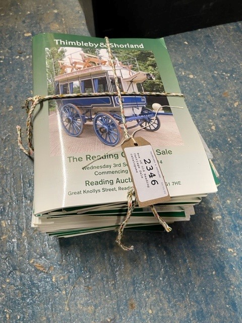 Box of old Reading Carriage Sale catalogues