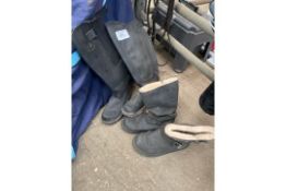 Pair of Mountain Horse thermal riding boots, UGG boots, black riding boots, and Argo safety boots