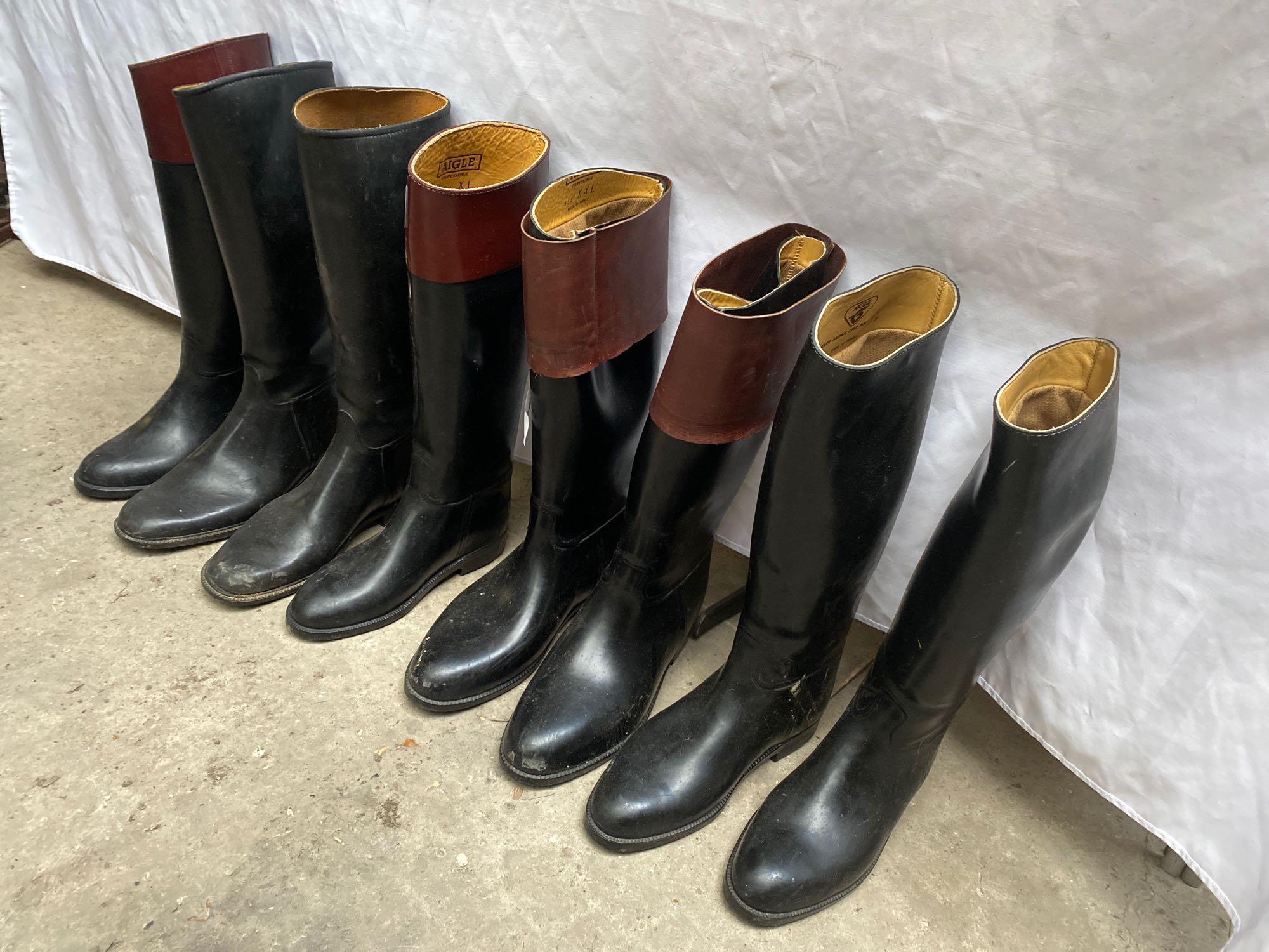 Four pairs of long rubber riding boots
