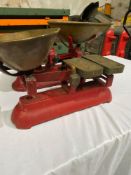 Two sets of weighing scales including weights