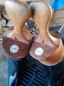 A pair of Tom Hill of Knightsbridge wooden boot trees and a pair of size 7 leather riding boots