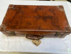 Leather suitcases, brief case and Gladstone bag