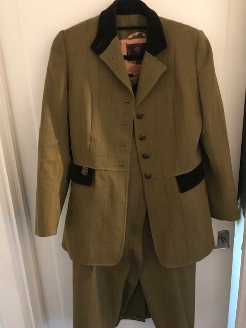 Private drive ladies' mulberry coloured suit size 8.