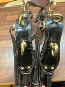 Set of black/patent/brass harness.