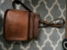 Antique brown leather money bag