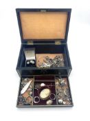 A jewellery box containing mainly silver jewellery