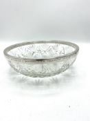 Cut glass fruit bowl with silver rim