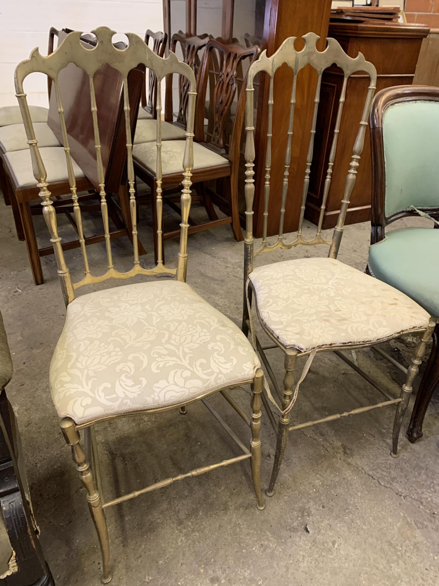 Two brass frame chairs