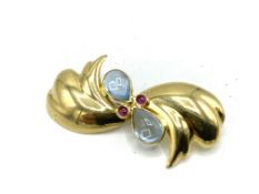 18ct gold brooch set, with aquamarines and rubies