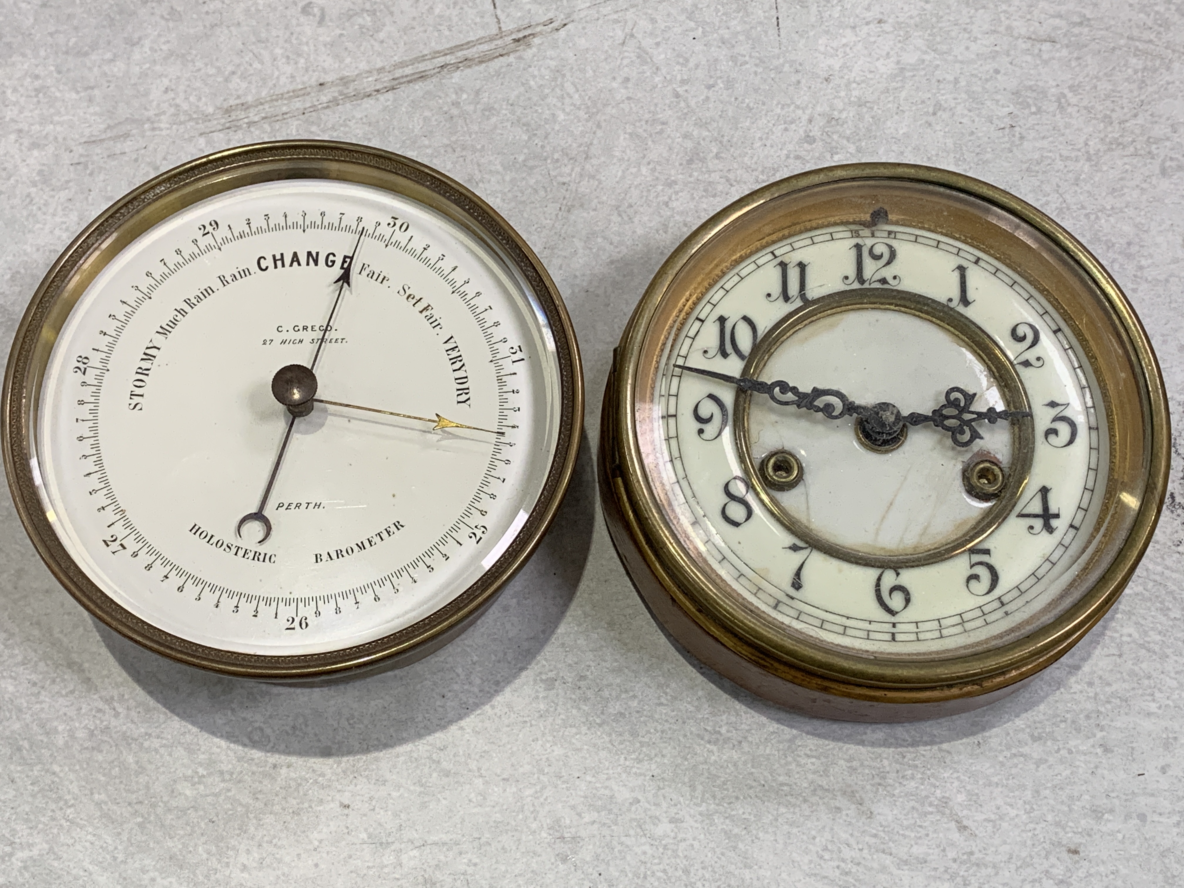 C Greco of Perth brass Holosteric barometer together with a circular wall clock