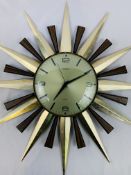 A Metamec starburst quartz wall clock