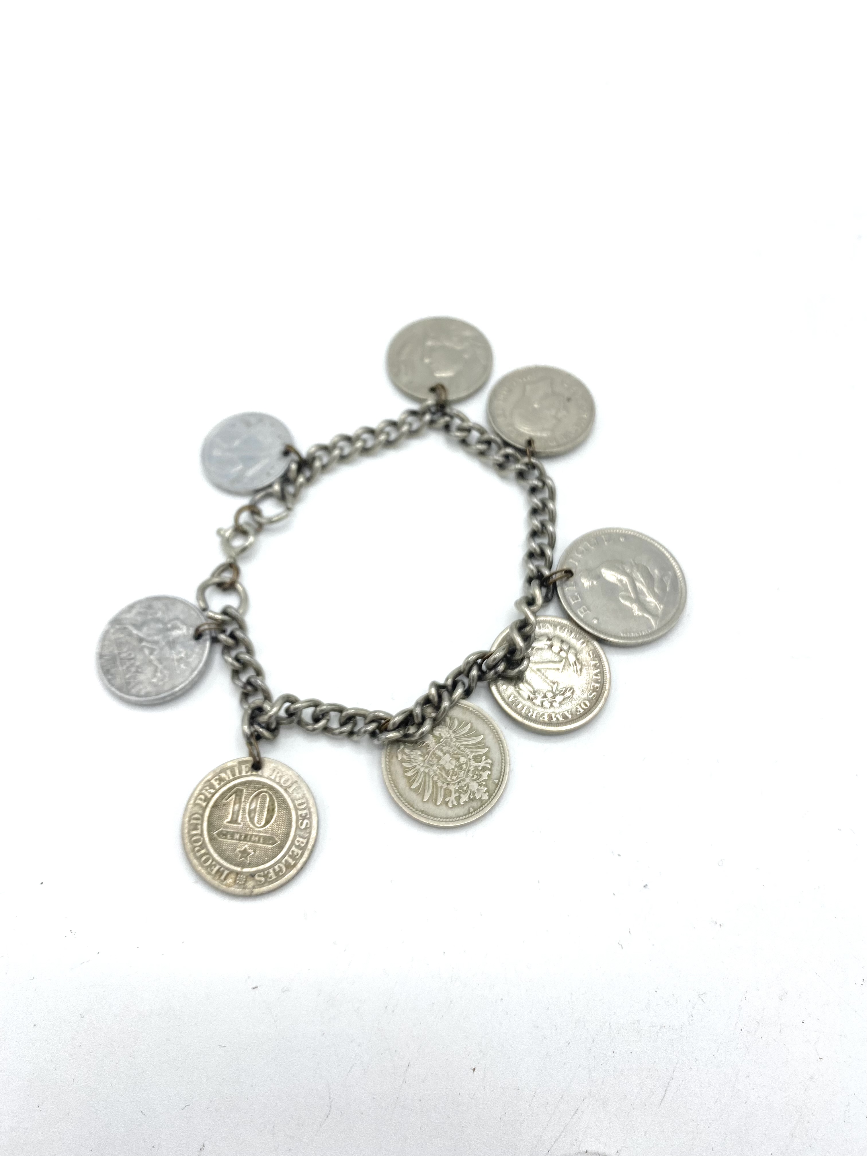 Hallmarked silver charm bracelet and two coin bracelets - Image 3 of 4