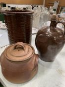 A stoneware flagon, jar and a pottery vase