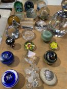 19 glass paperweights to include five Caithness and a glass perfume bottle