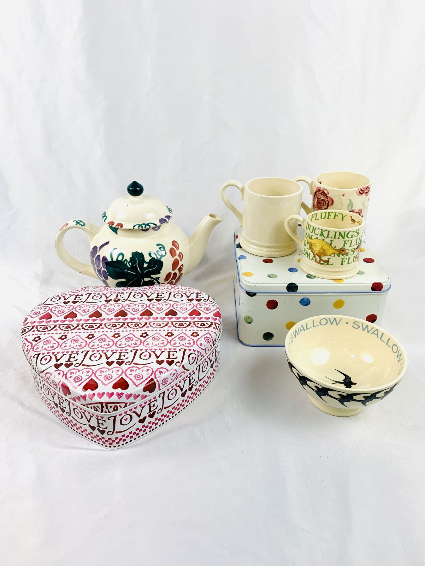 A quantity of Emma Bridgewater pottery and tins