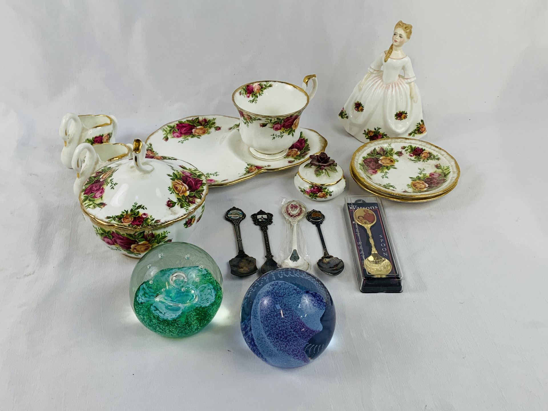 A quantity of Royal Albert, a Caithness paperweight and other items