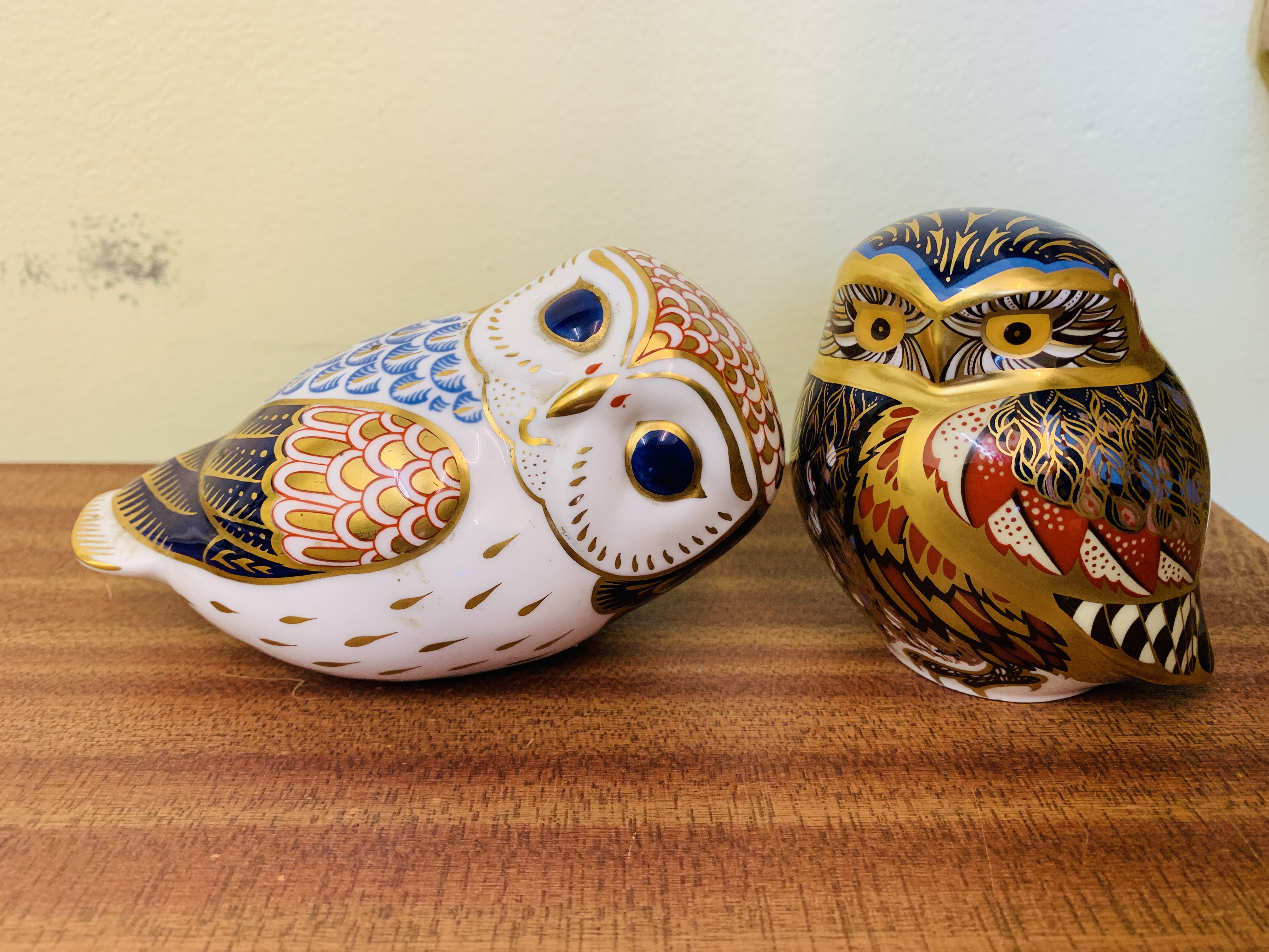 Two Royal Crown Derby owls