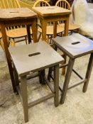 Four wooden stools