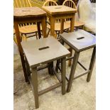 Four wooden stools