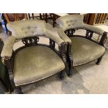 Pair of open back upholstered tub chairs