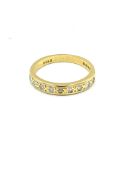 18ct Gold eternity ring, set with 9 diamonds